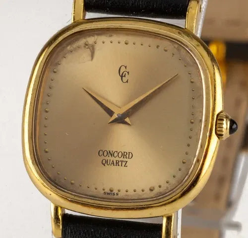 Montre à quartz femme Concord en or jaune 18 carats avec bracelet cuir