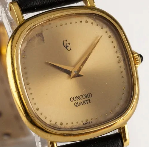 Montre à quartz femme Concord en or jaune 18 carats avec bracelet cuir