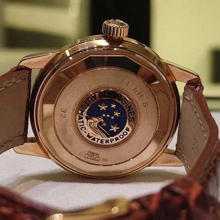 Montre Longines Heritage Conquest Automatique  18 carats