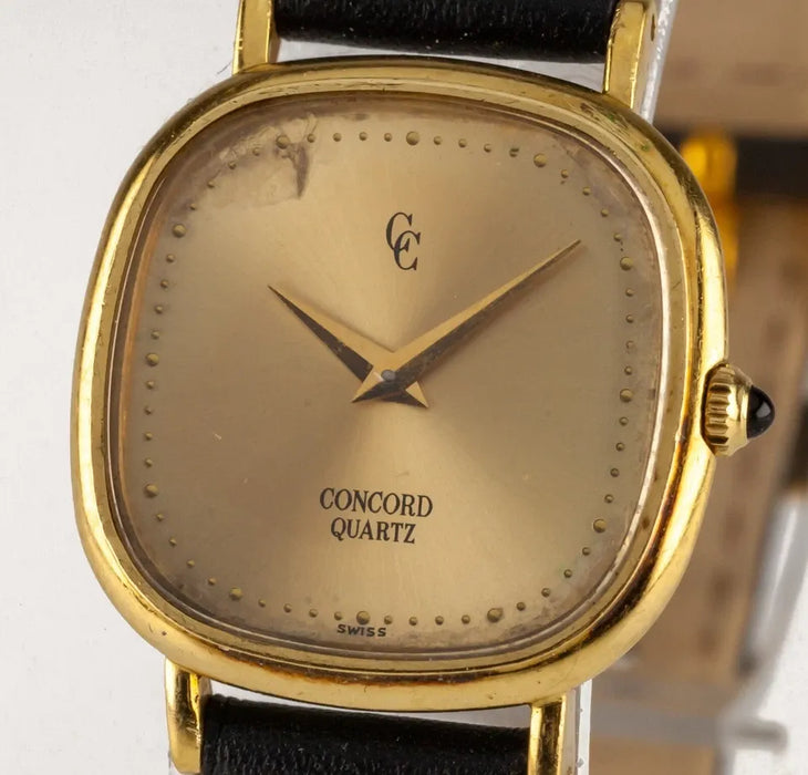 Montre à quartz femme Concord en or jaune 18 carats avec bracelet cuir