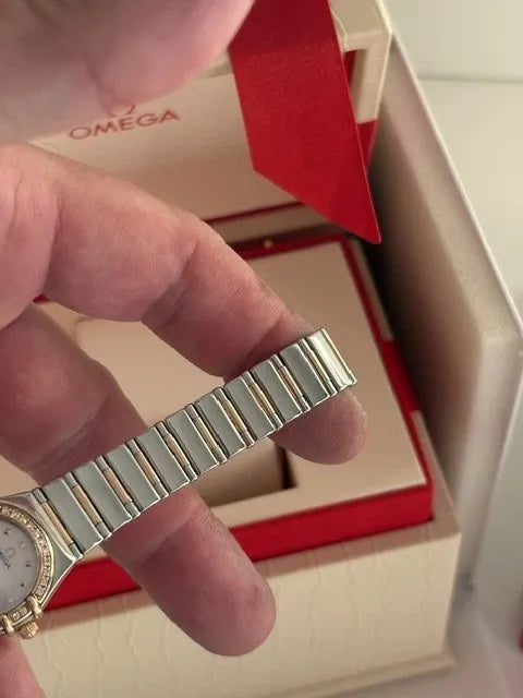 Montre femme Omega Constellation or 18 carats et lunette diamant acier série complète 2003