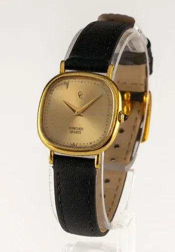 Montre à quartz femme Concord en or jaune 18 carats avec bracelet cuir