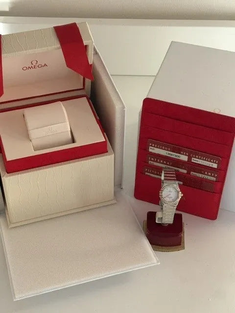 Montre femme Omega Constellation or 18 carats et lunette diamant acier série complète 2003