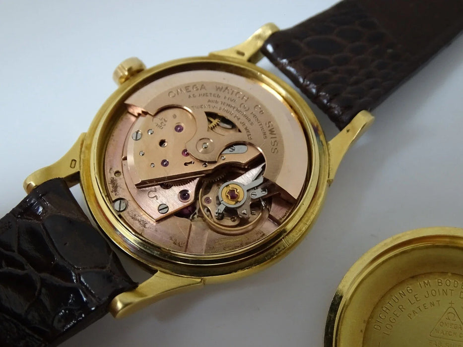 Montre Omega Constellation automatique or massif 18 carats vintage