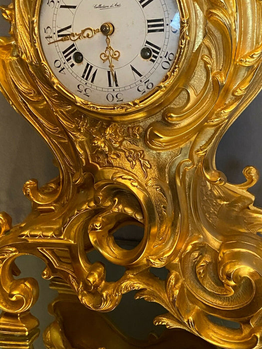 Pendule cartel en bronze doré de style Louis XV