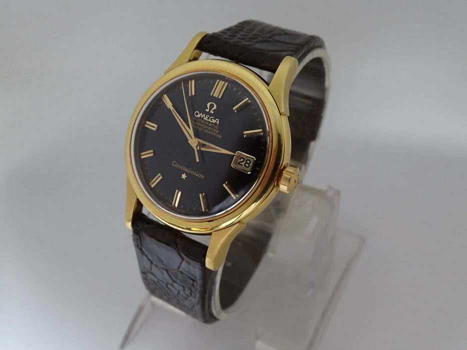 Montre Omega Constellation automatique or massif 18 carats vintage