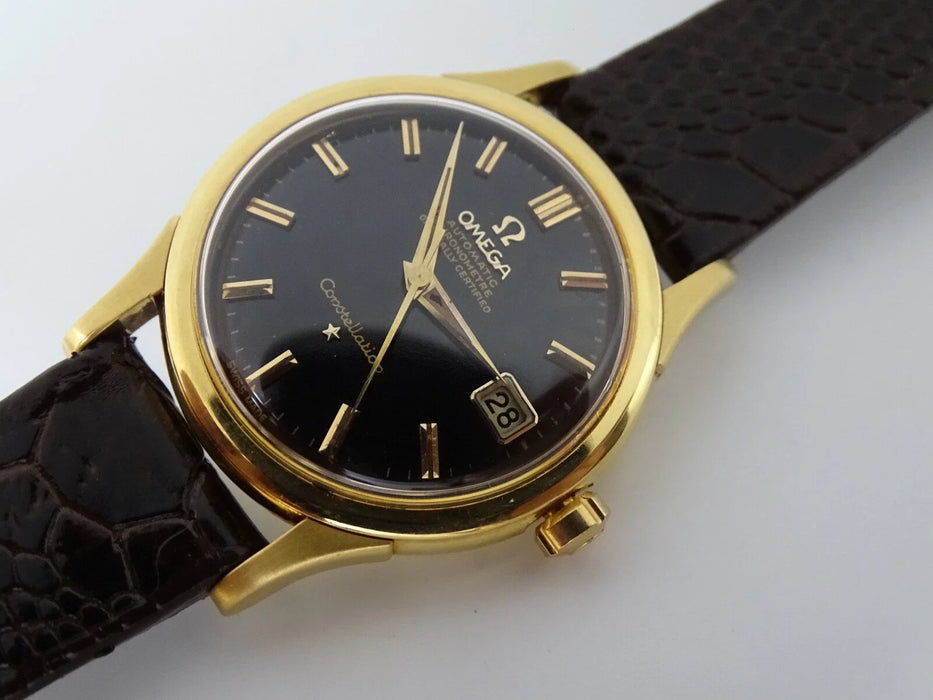 Montre Omega Constellation automatique or massif 18 carats vintage