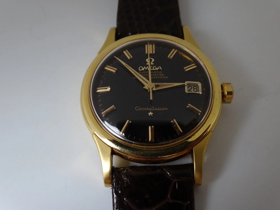 Montre Omega Constellation automatique or massif 18 carats vintage
