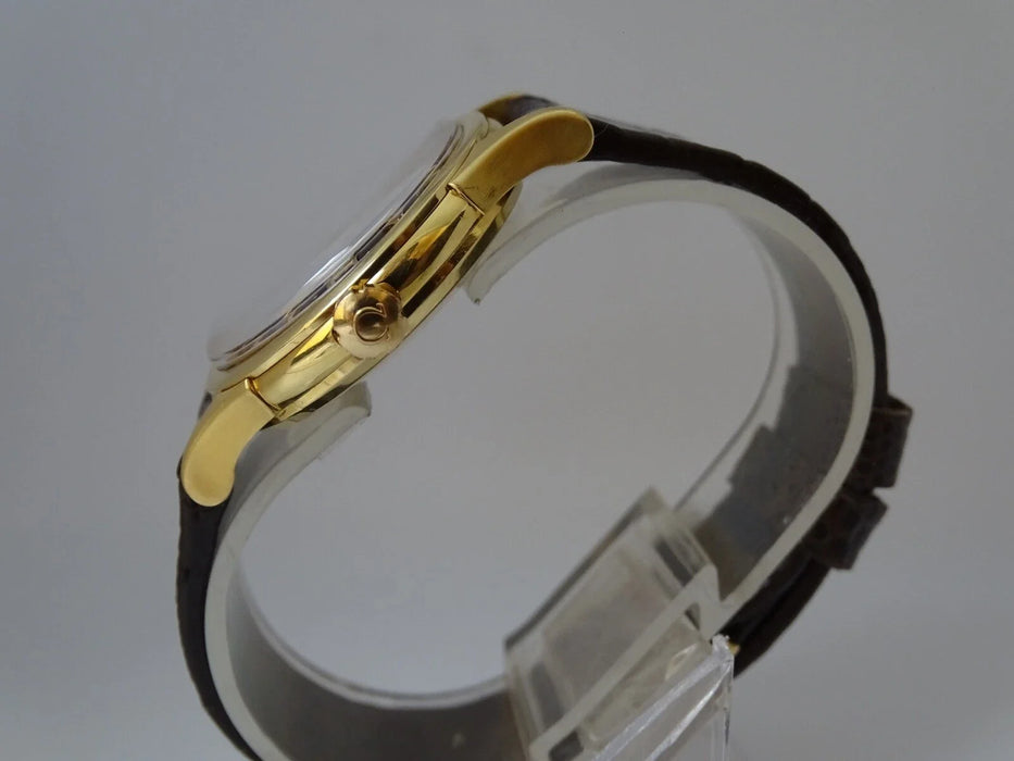 Montre Omega Constellation automatique or massif 18 carats vintage