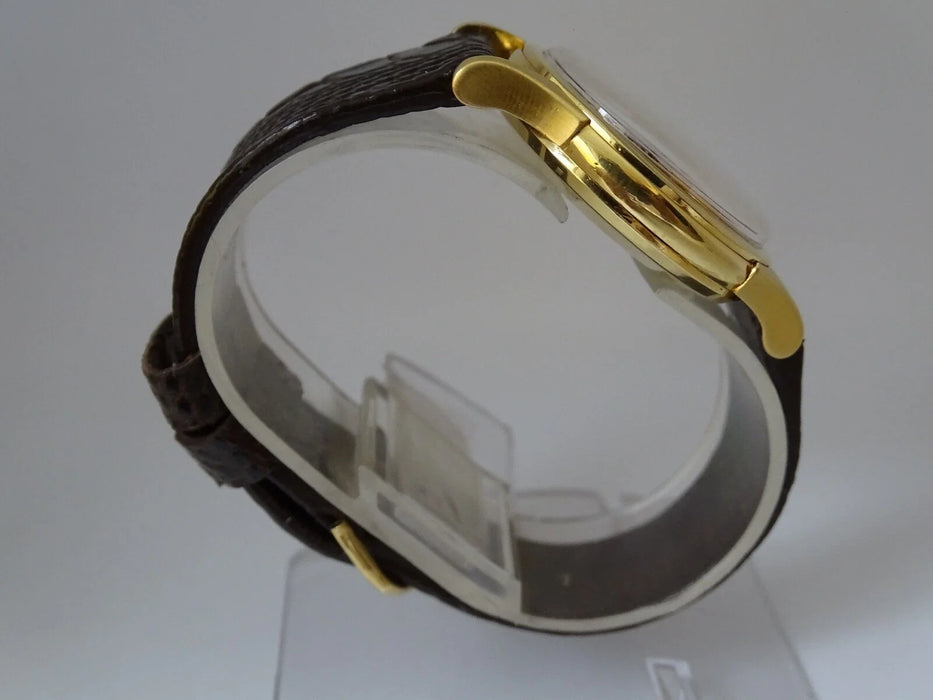 Montre Omega Constellation automatique or massif 18 carats vintage