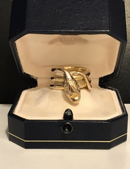 Bague en or 18 carats serpent yeux diamants
