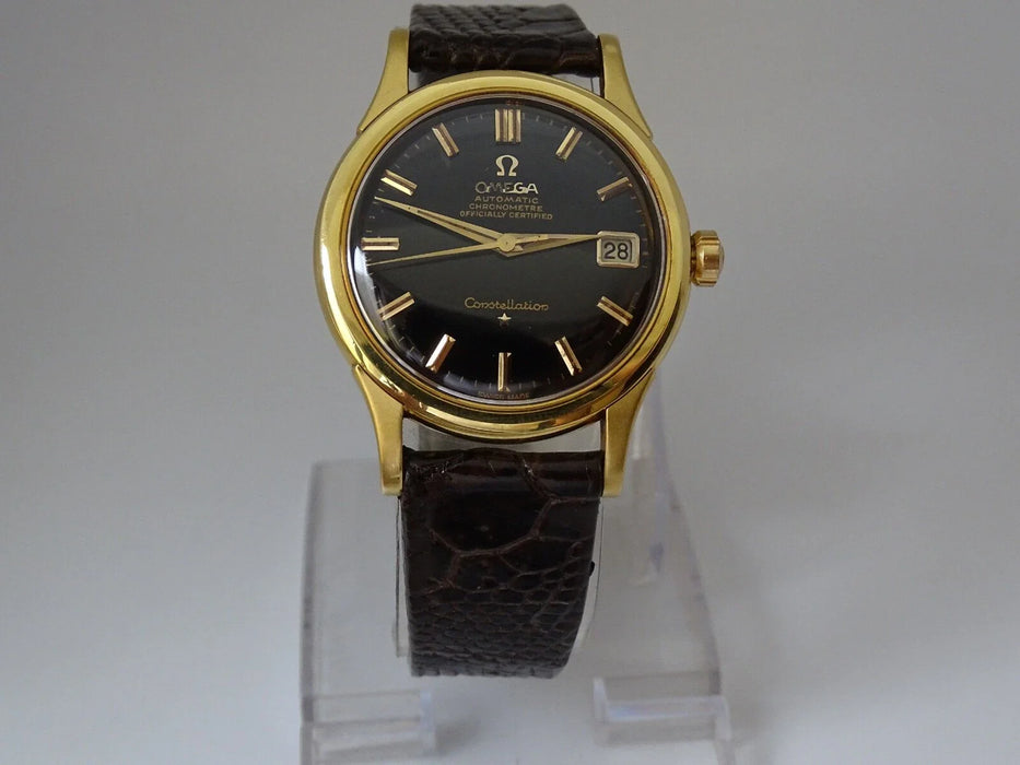Montre Omega Constellation automatique or massif 18 carats vintage